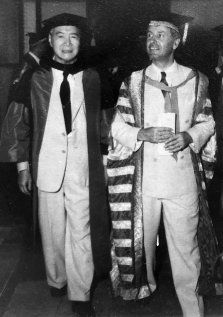 Dr Chen Su Lan in academic robes receiving an honorary Doctor of Laws beside Chancellor Sir Malcolm MacDonald in 1952